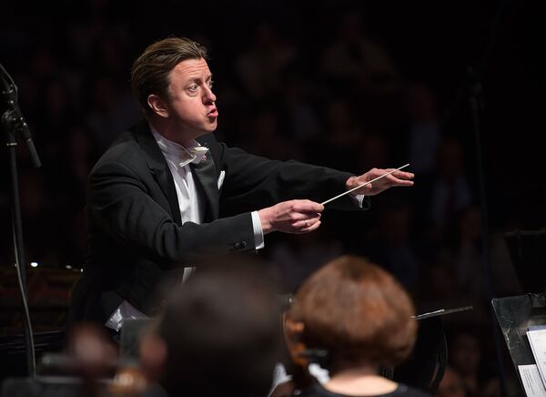 Известный шведский дирижер Кристофер Валландер Известный шведский дирижер Кристофер Валландер - Sputnik Армения