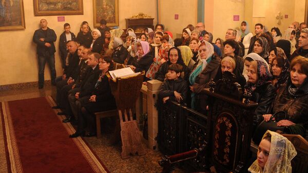 Министр обороны Грузии Тинатин Xидашели на пасхальной литургии в армянской церкви Сурб Геворк - Sputnik Армения