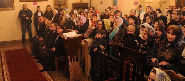 Министр обороны Грузии Тинатин Xидашели на пасхальной литургии в армянской церкви Сурб Геворк - Sputnik Армения