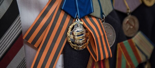 Орден защитника отечества и Георгиевская ленточка Орден защитника отечества и Георгиевская ленточка - Sputnik Արմենիա