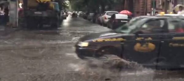 Последствия сильного дождя в Ереване Последствия сильного дождя в Ереване - Sputnik Արմենիա