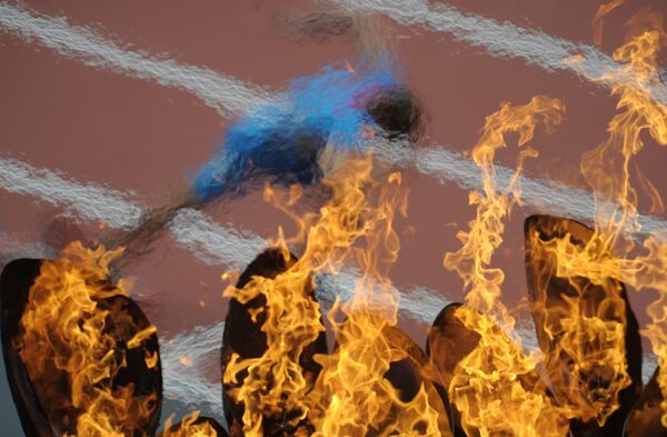 Российский спортсмен Вячеслав Сакаев на старте дистанции 400 м с барьерами на XXX летних Олимпийских играх в Лондоне. - Sputnik Армения