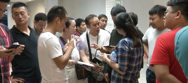 СПУТНИК_Тайцы в больнице проверяли списки раненных и погибших во время взрыва в Бангкоке СПУТНИК_Тайцы в больнице проверяли списки раненных и погибших во время взрыва в Бангкоке - Sputnik Армения