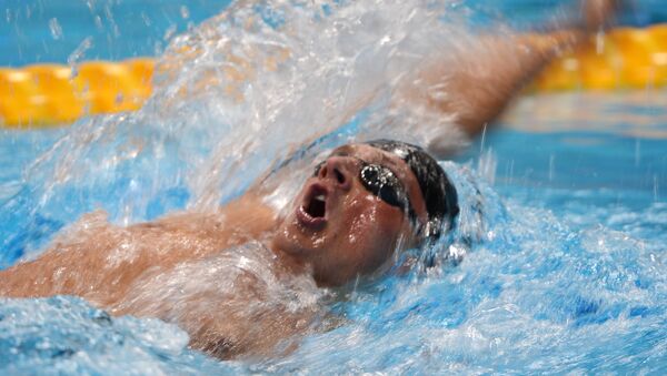 Американец Райан Лохте в финальном заплыве на 400 метров комплексным плаванием среди мужчин на XXX летних Олимпийских играх в Лондоне. - Sputnik Արմենիա