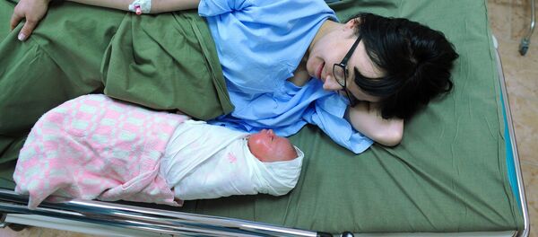 Роженица с новорожденным Роженица с новорожденным - Sputnik Армения