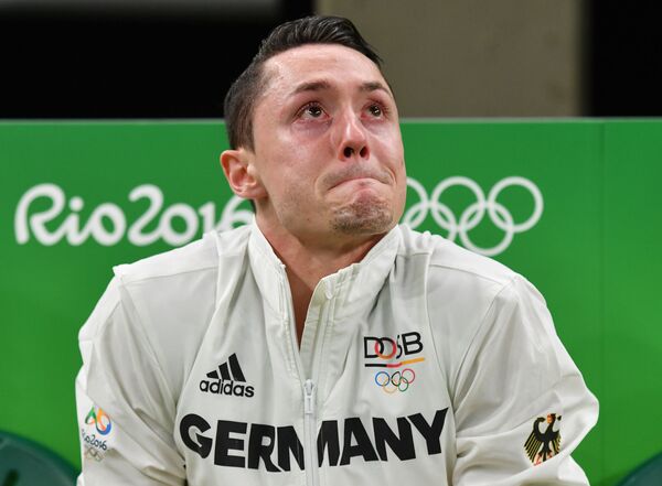 Гимнаст из Германии Андреас Тоба плачет на XXXI летних Олимпийских играх - Sputnik Армения