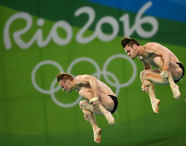 Давид Будайя и Стил Джонсон (США) во время финальных соревнований по синхронным прыжкам с вышки 10 м среди мужчин на XXXI летних Олимпийских играх - Sputnik Армения
