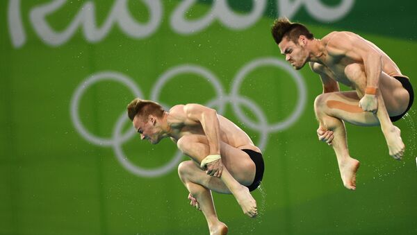 Давид Будайя и Стил Джонсон (США) во время финальных соревнований по синхронным прыжкам с вышки 10 м среди мужчин на XXXI летних Олимпийских играх - Sputnik Армения
