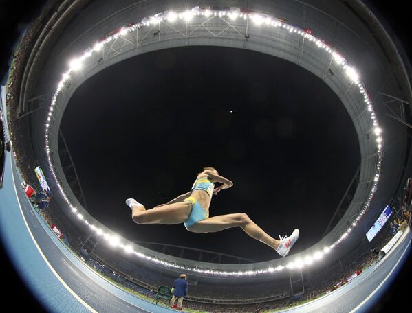 Прыгунья Ольга Рыпакова из Казахстана во время соревнований на XXXI летних Олимпийских играх в Рио-де-Жанейро - Sputnik Армения