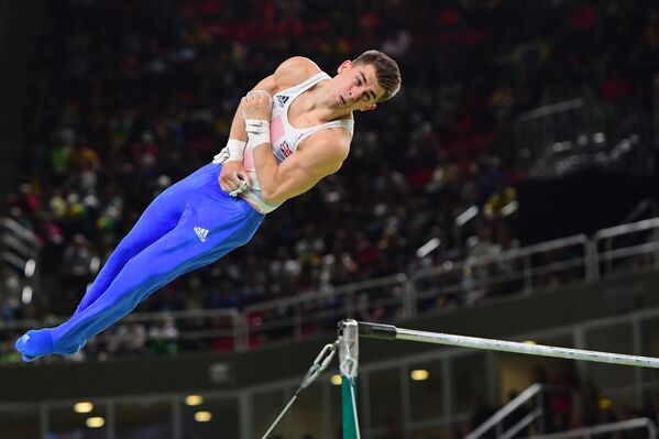 Гимнаст Макс Уитлок из Великобритании во время соревнований на Олимпийских играх-2016 в Рио-де-Жанейро - Sputnik Армения