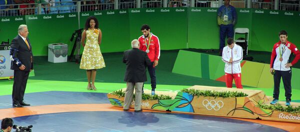 Мигран Арутюнян на олимпийском пьедестале Мигран Арутюнян на олимпийском пьедестале - Sputnik Արմենիա