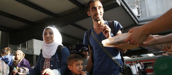 Ситуация с мигрантами в Германии Ситуация с мигрантами в Германии - Sputnik Армения