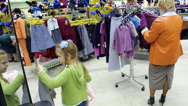 Продажа детской одежды в магазине Детский мир в Москве - Sputnik Армения