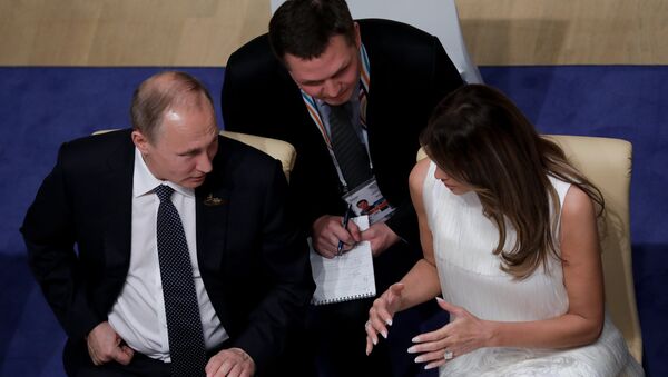 Владимир Путин и Первая леди США Меланья Трамп на банкете в рамках саммита G20 - Sputnik Արմենիա