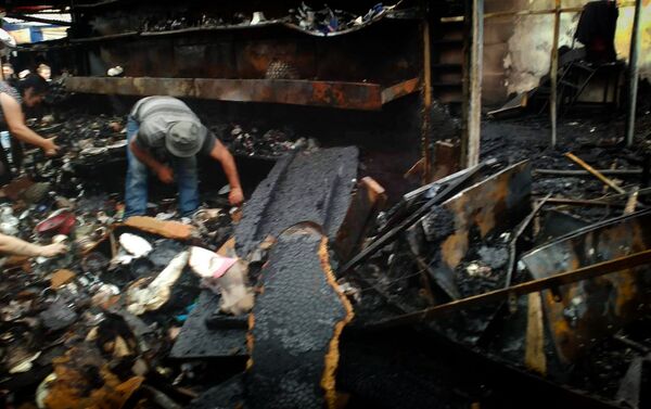 Последствия пожара на вещевом рынке в Поти - Sputnik Армения