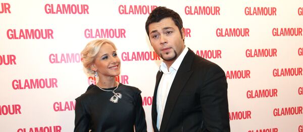 Ю.Ковальчук и А.Чумаков после церемонии вручения премии Женщина года Glamour 2009 - Sputnik Армения