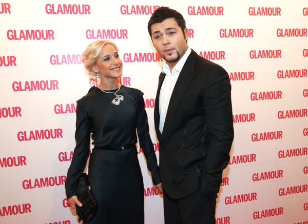 Ю.Ковальчук и А.Чумаков после церемонии вручения премии Женщина года Glamour 2009 Ю.Ковальчук и А.Чумаков после церемонии вручения премии Женщина года Glamour 2009 - Sputnik Արմենիա