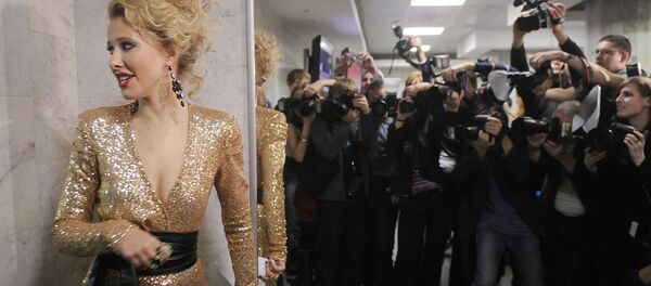 Телеведущая Ксения Собчак перед началом церемонии вручения музыкальной премии Золотой граммофон Телеведущая Ксения Собчак перед началом церемонии вручения музыкальной премии Золотой граммофон - Sputnik Армения