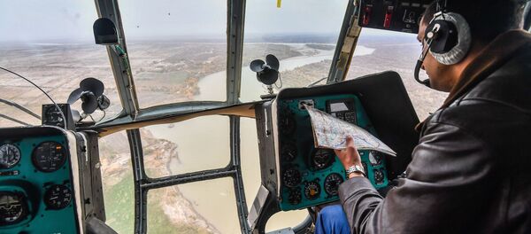 Экипаж вертолета во время совместных антитеррористических учений коллективных сил быстрого реагирования государств-членов ОДКБ на полигоне Халкайер в Таджикистане - Sputnik Армения