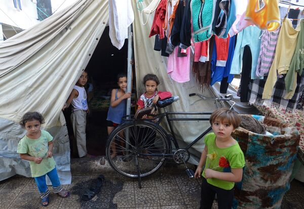 Лагерь беженцев в Дамаске Лагерь беженцев в Дамаске - Sputnik Армения