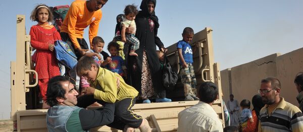 Беженцы в районе города Киркук в Ираке - Sputnik Армения