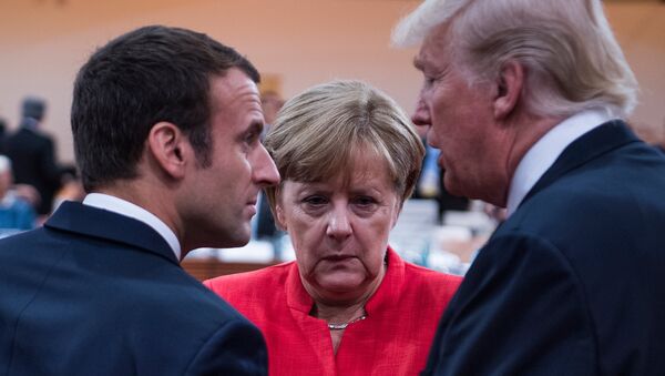 Президент Франции Эммануэль Макрон, канцлер Германии Ангела Меркель и президент США Дональд Трамп во время встречи G20 /7 июля 2017/. Гамбург, Германия - Sputnik Армения