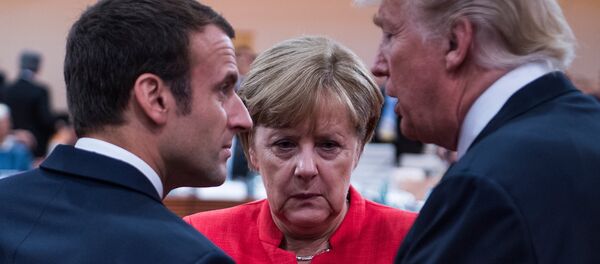 Президент Франции Эммануэль Макрон, канцлер Германии Ангела Меркель и президент США Дональд Трамп во время встречи G20 /7 июля 2017/. Гамбург, Германия - Sputnik Армения