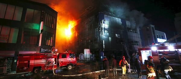 Пожар в фитнесс-центре в Ю. Корее Пожар в фитнесс-центре в Ю. Корее - Sputnik Армения