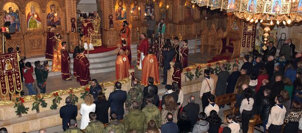 Греческий православный патриарх Антиохии и всего Востока Иоанн Икс Языги проводит молитву во время рождественской мессы в Православной церкви Илии (24 декабря 2016). Алеппо, Сирия Греческий православный патриарх Антиохии и всего Востока Иоанн Икс Языги проводит молитву во время рождественской мессы в Православной церкви Илии (24 декабря 2016). Алеппо, Сирия - Sputnik Արմենիա